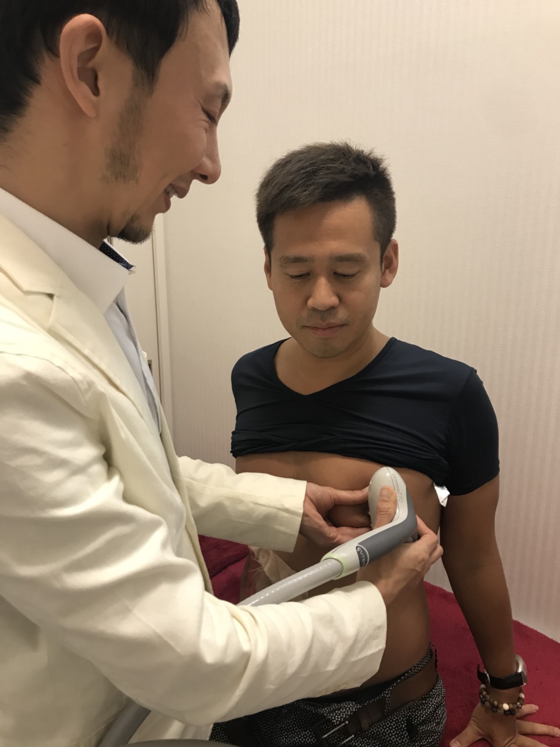 名医、田中医師と竹井佑介